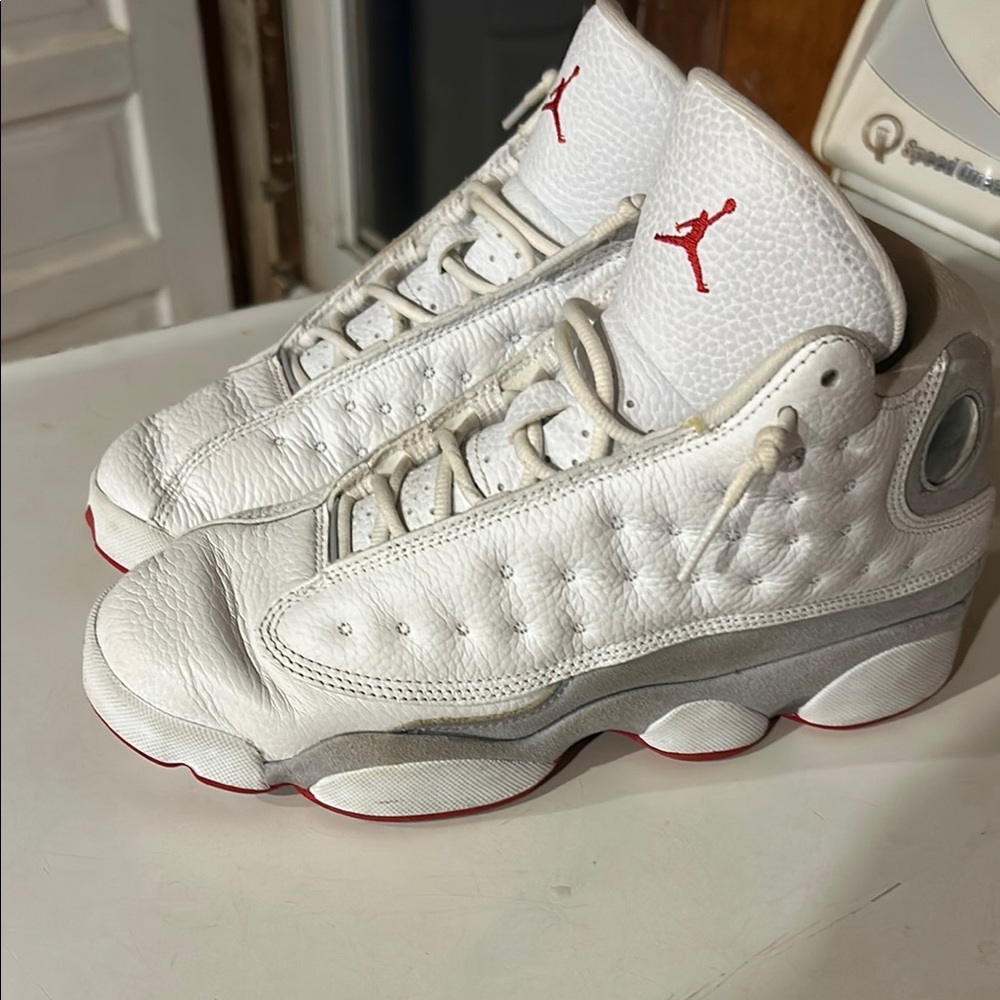 White and Gray Air Jordan Sneakers with Perforated Details